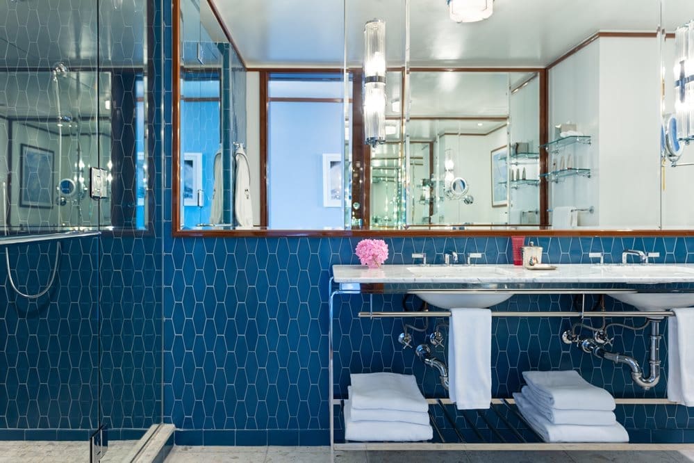 c suite bathroom internal shot with basin and shower