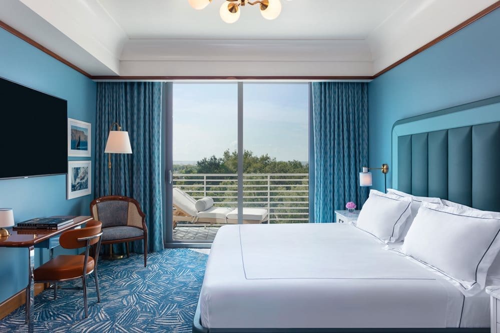 presidential suite master bedroom with tv and study table