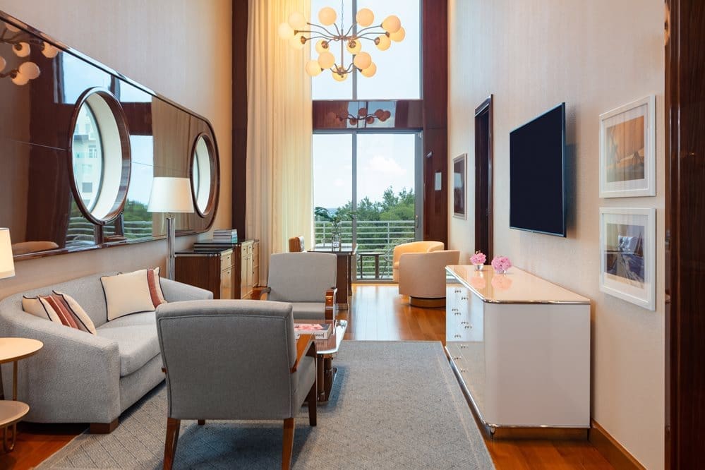 full view of the presidential suite dining room with seating space